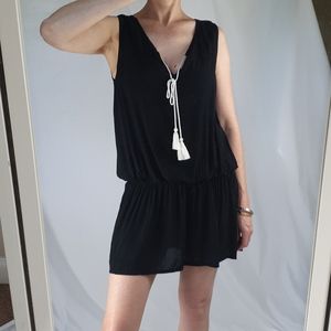 Black cotton mini dress with white tassels